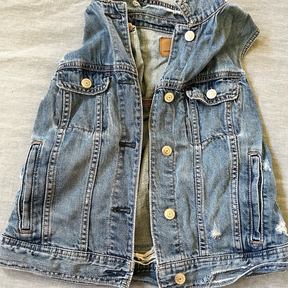 Distressed jean vest American Eagle